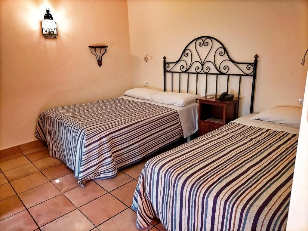 Dreibettzimmer — Abadía Hotel