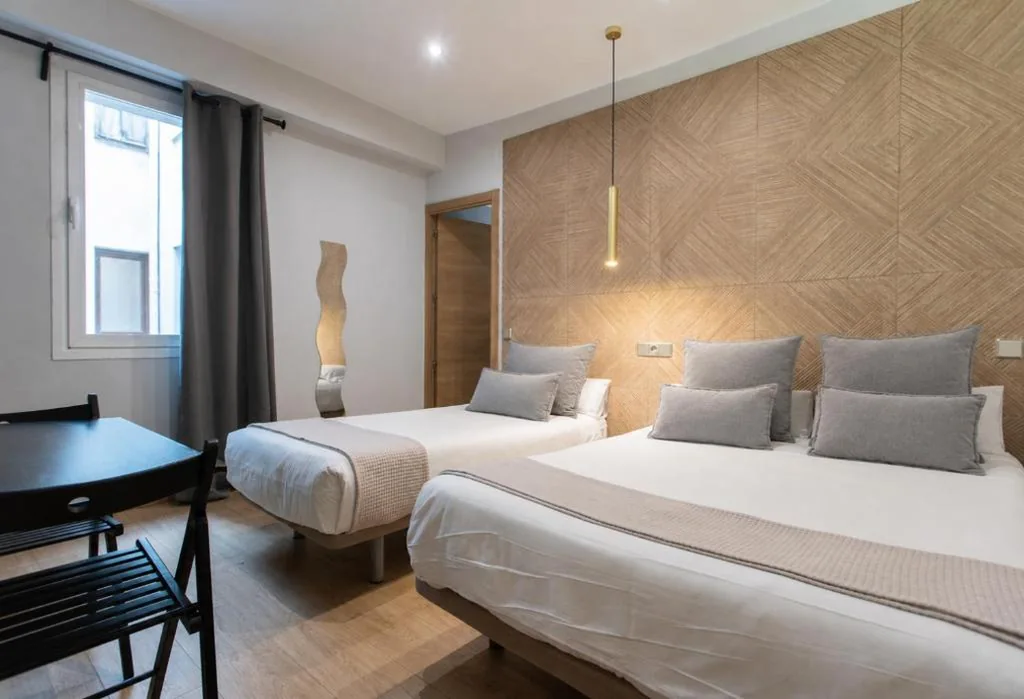 Triple Room with Private Bathroom — AbraCadabra Suites