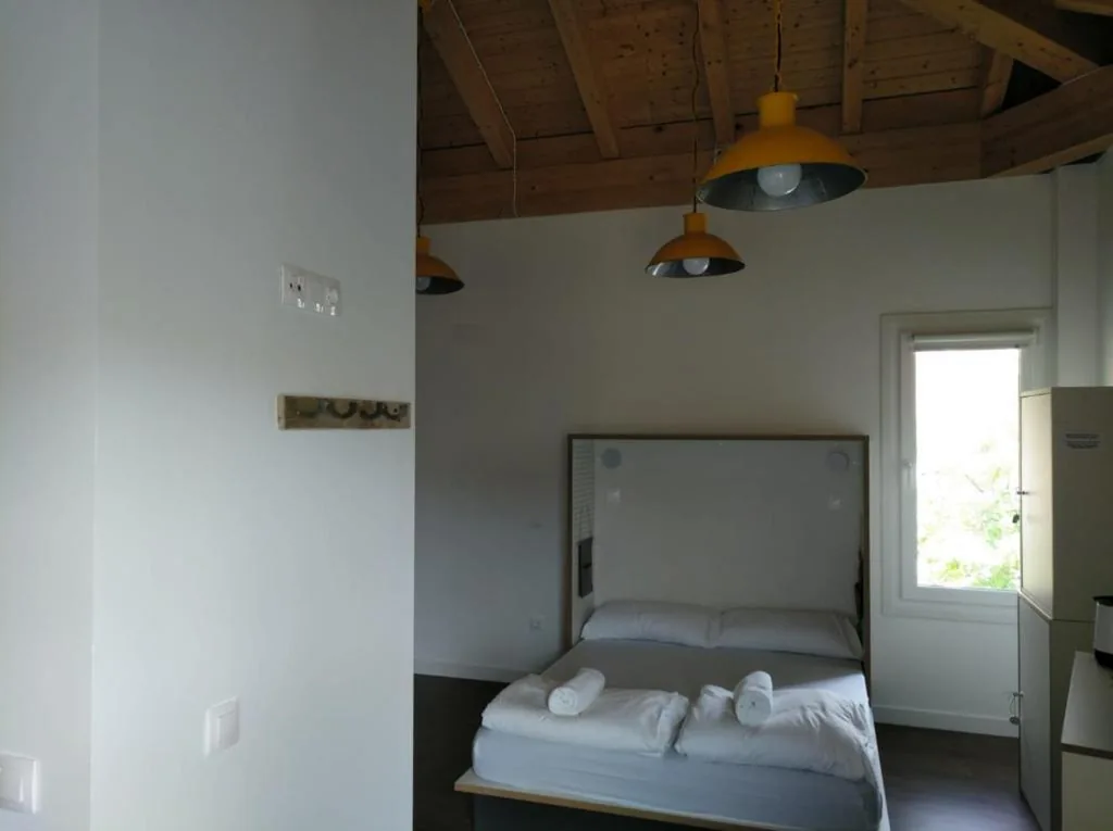 Habitación Cuádruple Confort — Agora Hostel