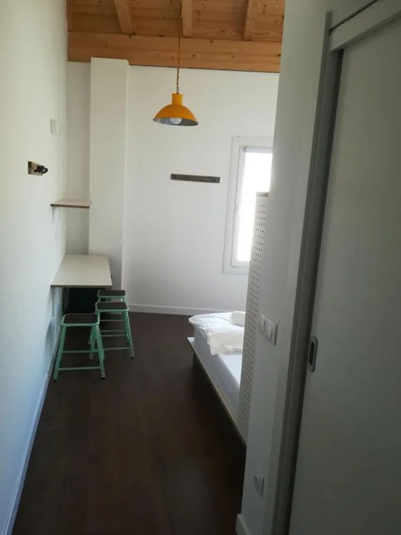 Habitación Triple — Agora Hostel