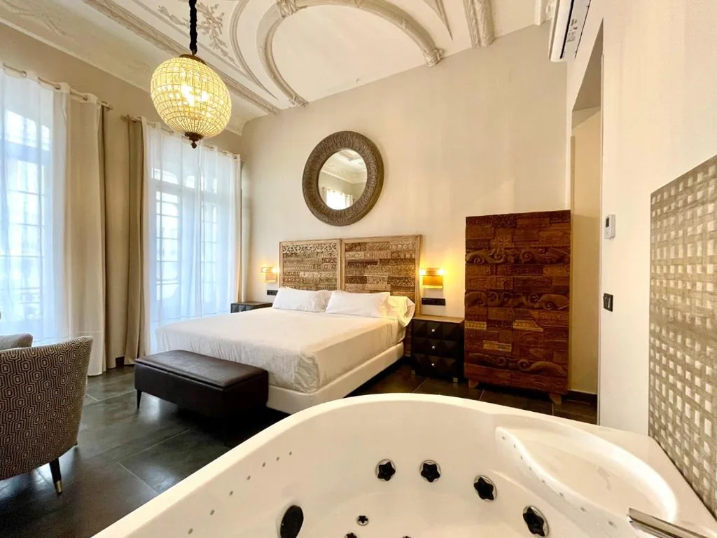 Suite Deluxe avec baignoire balnéo — Akla Hotel Badajoz
