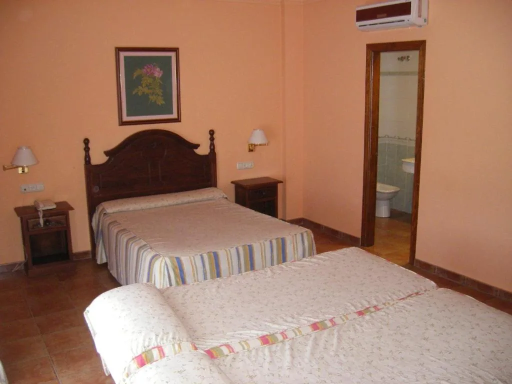 Quadruple Room — Albenzaire Hotel Asador