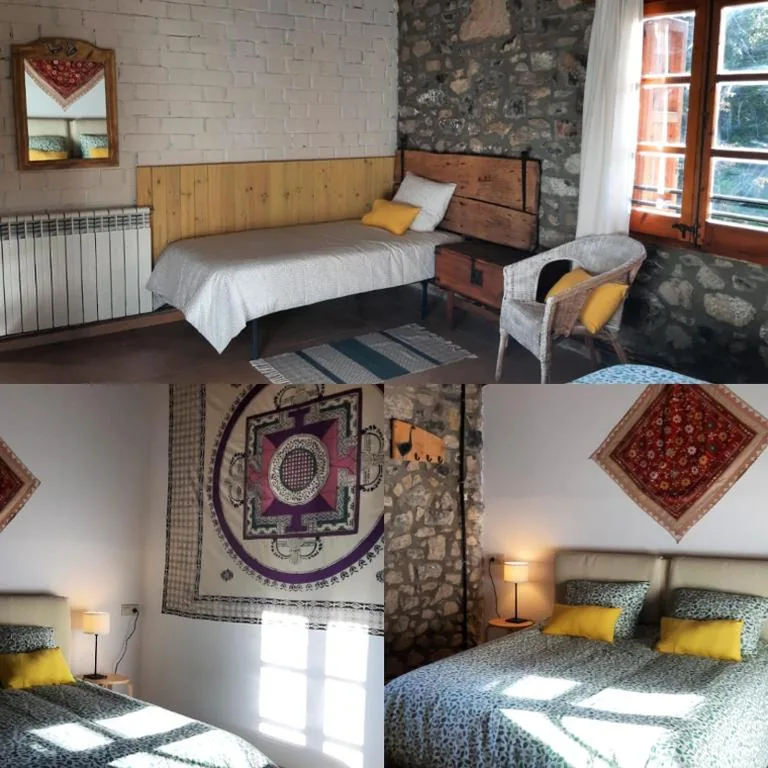 Habitación Cuádruple - vistas al jardín — Alberg Rural La Rectoria de Pedra
