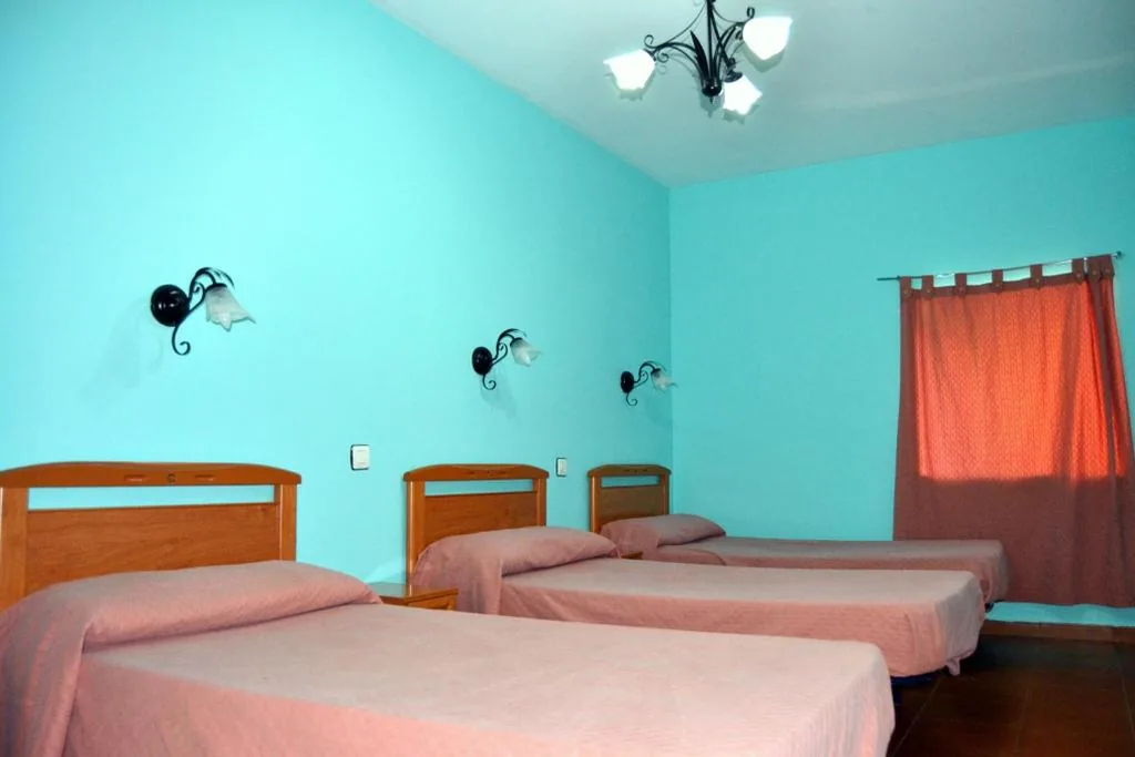 Habitación Triple — Albergue Aurora Boreal