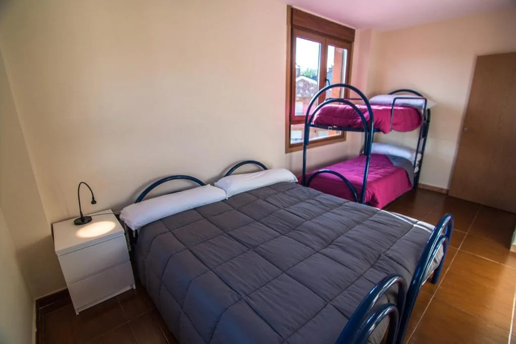 Camera quadrupla con bagno in comune — Albergue de Prioro