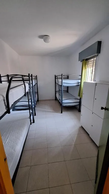 Bed in Shared Male Dormitory — Albergue de San Jose