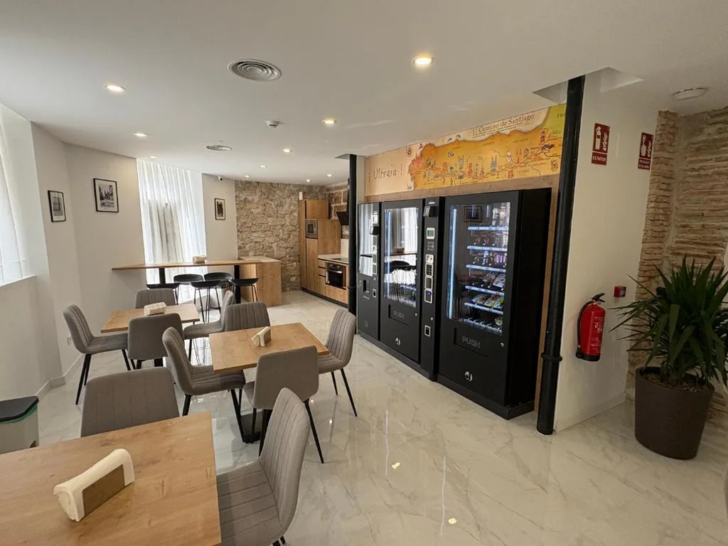 相部屋のシングルベッド — ALBERGUE EXCLUSIVO para PEREGRINOS ALAIA ROOMS