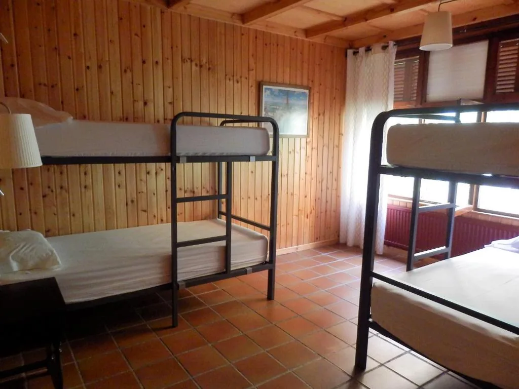 Cama em quarto partilhado com 4 camas — Albergue La Cabaña