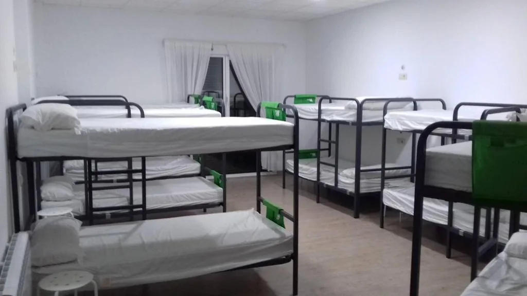 Cama individual en habitación compartida mixta — Albergue O Trisquel