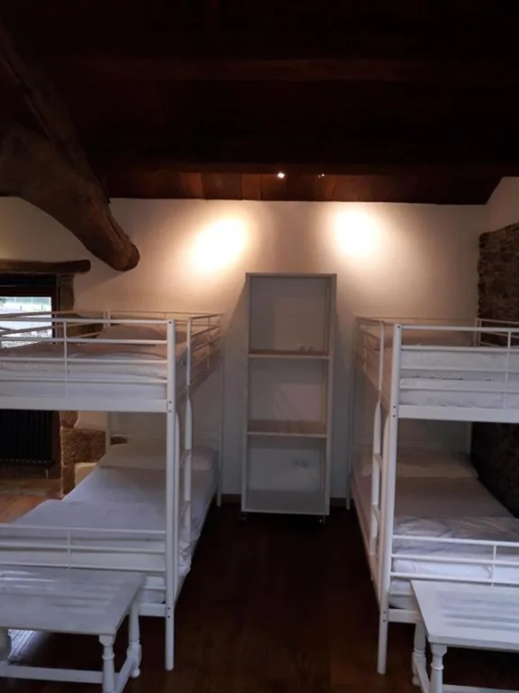 Cama individual en habitación compartida — Albergue o Xistral
