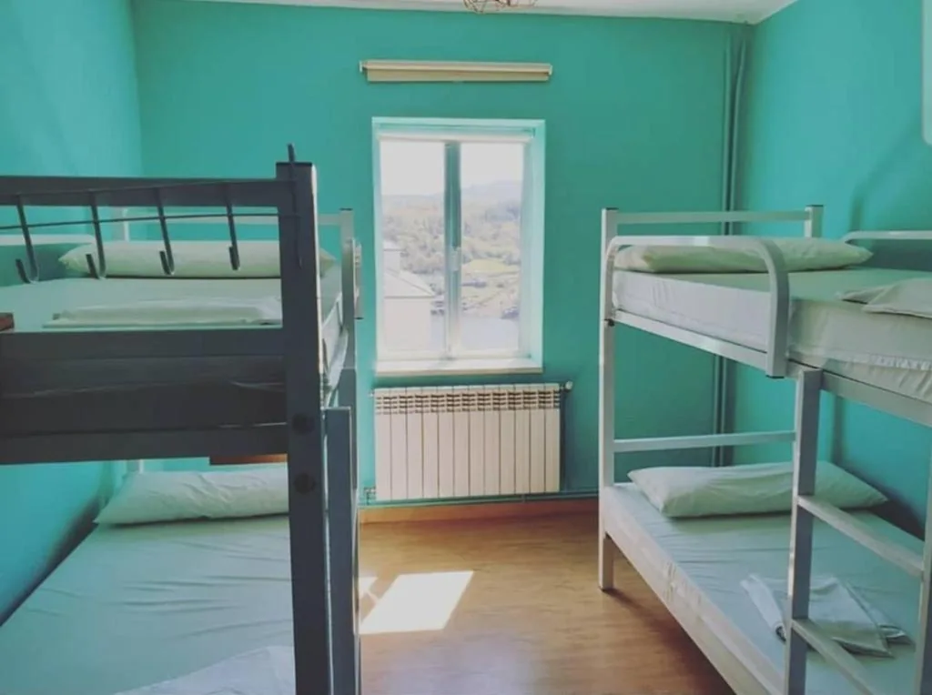 Habitación Cuádruple con baño compartido — ALBERGUE Pasiño A Pasiño