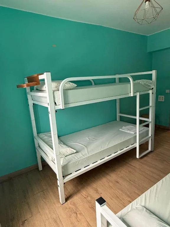 Habitación Triple con baño compartido — ALBERGUE Pasiño A Pasiño