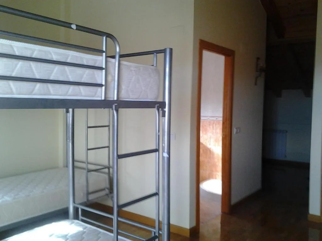 Habitación Cuádruple con baño compartido — Albergue Victoria