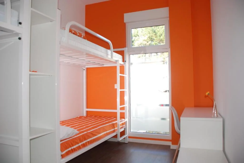 Litera en habitación compartida mixta de 4 camas — Albergue Xabarín