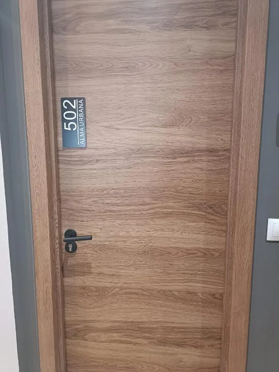 Tweepersoonskamer met externe privébadkamer — Alma Urbana Alojamiento