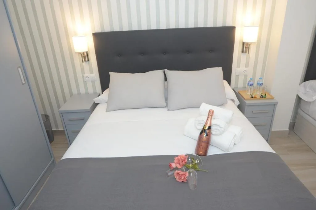 Deluxe Dreibettzimmer — Alojamiento Beethoven Luxury