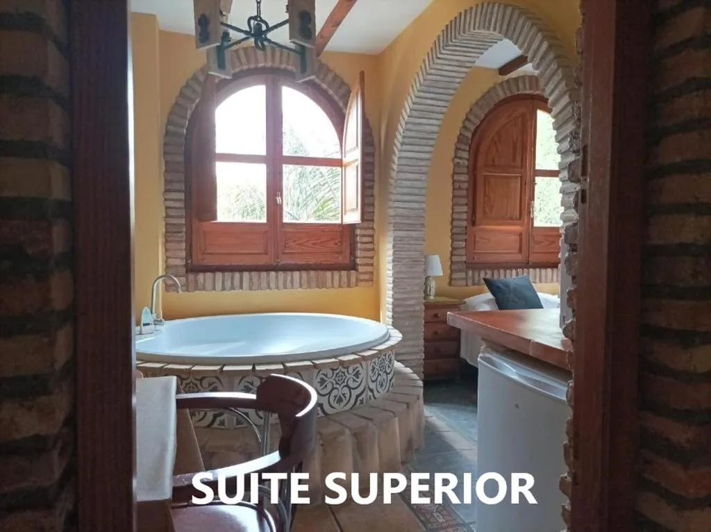 Suite Superior con letto extra large — Alojamientos La Casa de Piedra