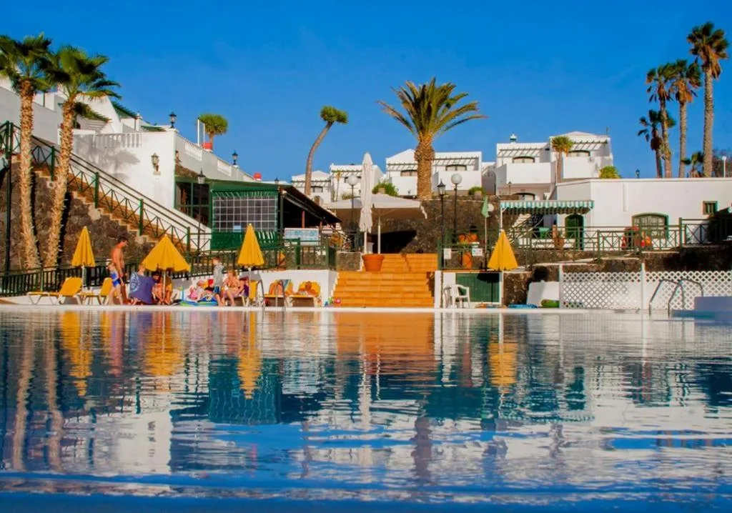 Suite com vista para o mar — Apartamentos San Marcial