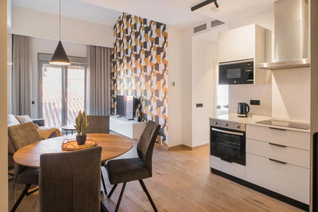 Habitación Cuádruple Deluxe — Apartamentos Turísticos Lagunillas 57