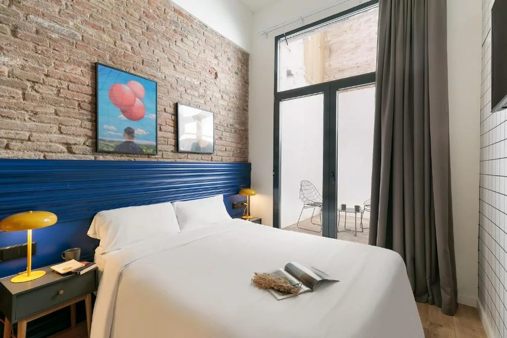 Habitación Doble con patio — Arte Suites by Olala! - Smart Stay