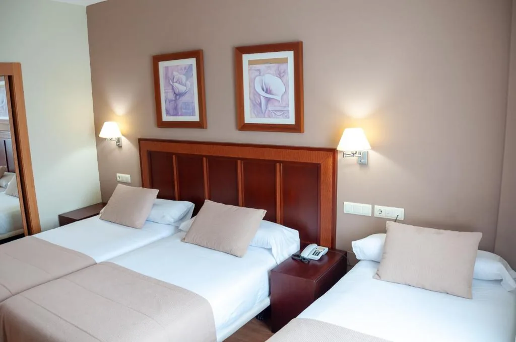 Quarto Duplo com cama extra - 2 camas — ARVA Santiago León