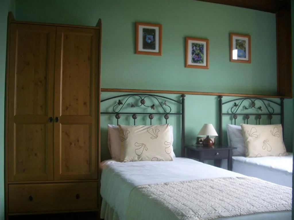 Habitación Familiar con vistas al jardín — As Jarras