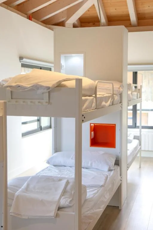 Lit simple dans un dortoir partagé — ATERPE KANPEZU HOSTEL