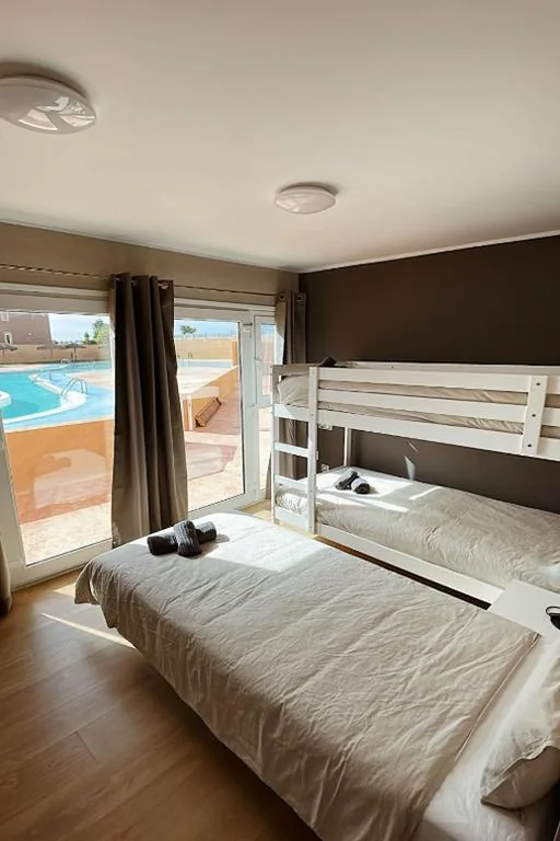 Litera en habitación compartida mixta — Banama Coliving 1 - Coworking, Surf & Yoga