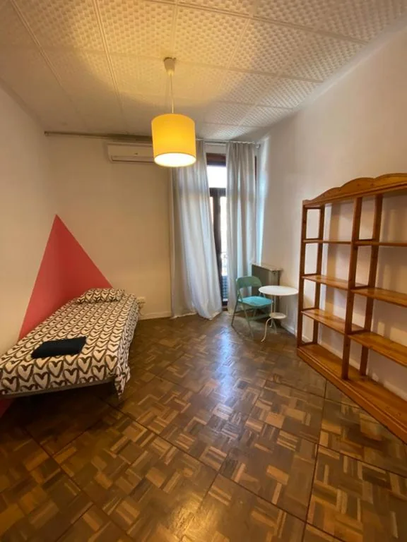 Basic Triple Room with Shared Bathroom — Barbieri Sol Hostel