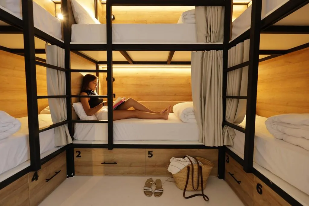 One bed in Female Room — BLACK AND WHITE Hostel Palamós