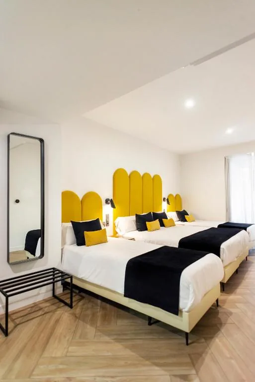 Habitación cuádruple — Blanq Comedias