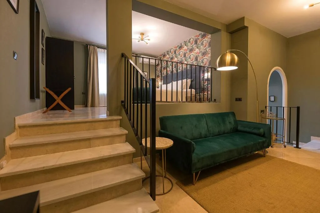 Suite Deluxe con cama extragrande — Boutique Suites