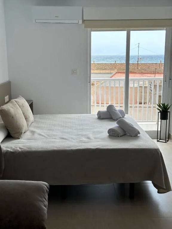 Vierbettzimmer — Brisa del mar Primera linea de playa