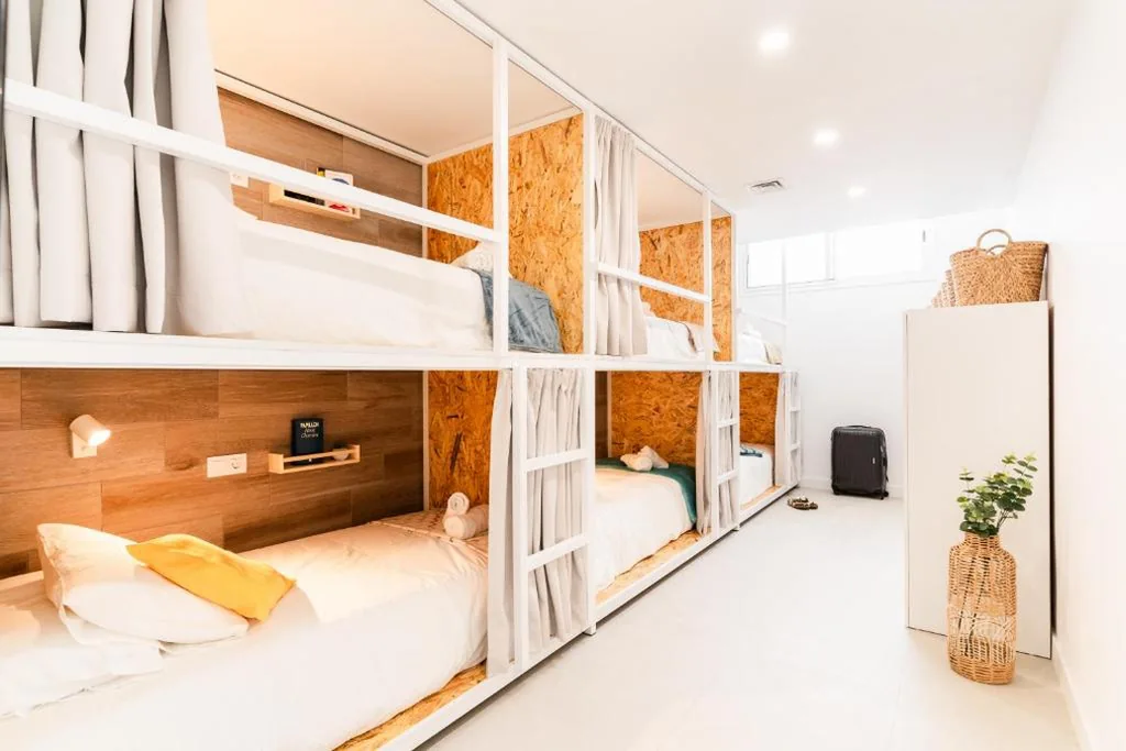 Cama individual em dormitório partilhado com 6 camas — Bucio Coliving