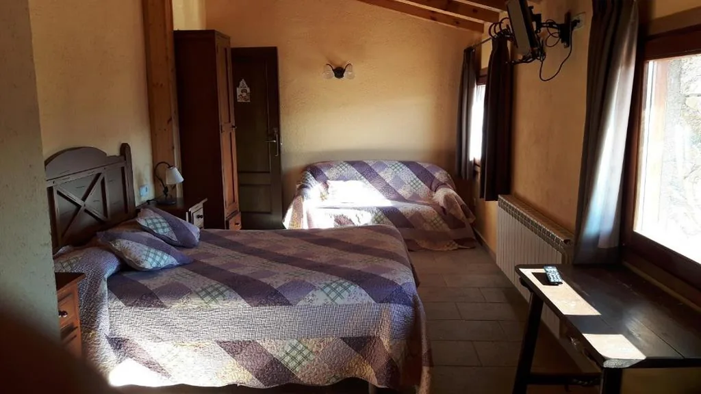 Triple Room with Mountain View — Ca l ' Isidró