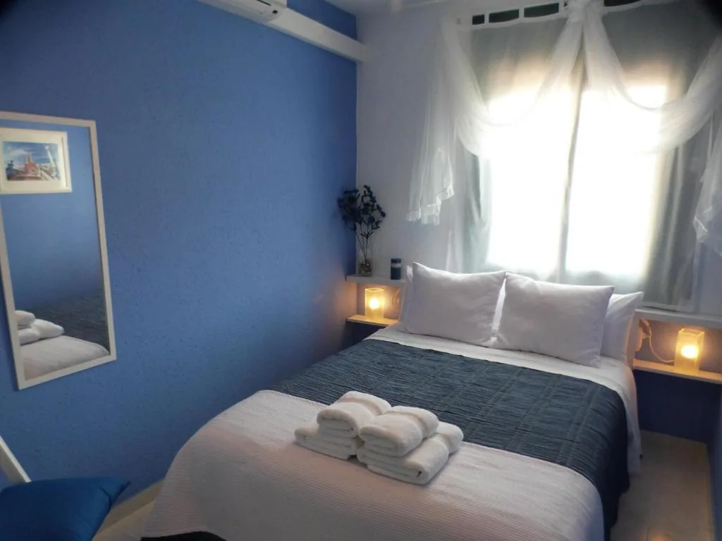 Quarto Duplo com casa de banho partilhada — Ca la Carmeta