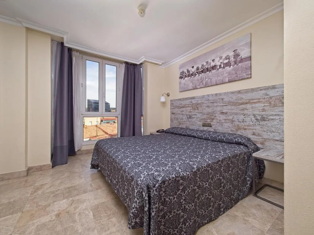 Standaardkamer met 1 groot bed — Caballero Errante