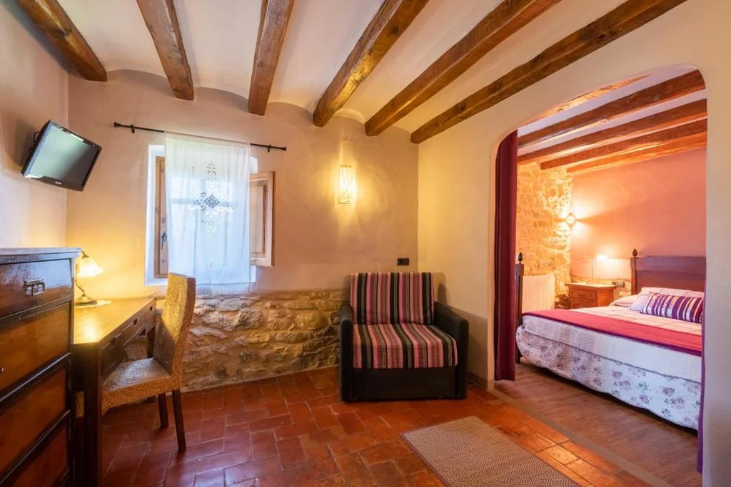 Suite con letto grande — Cal Ros