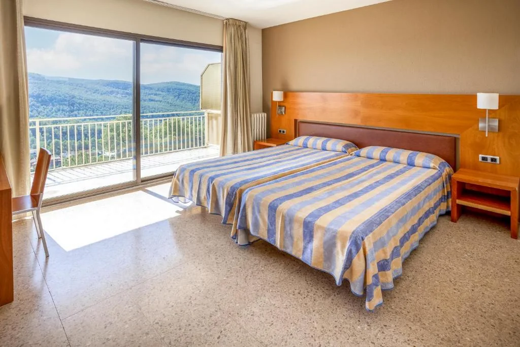 Camera quadrupla con terrazza — Can Fisa Hotel & Apartments