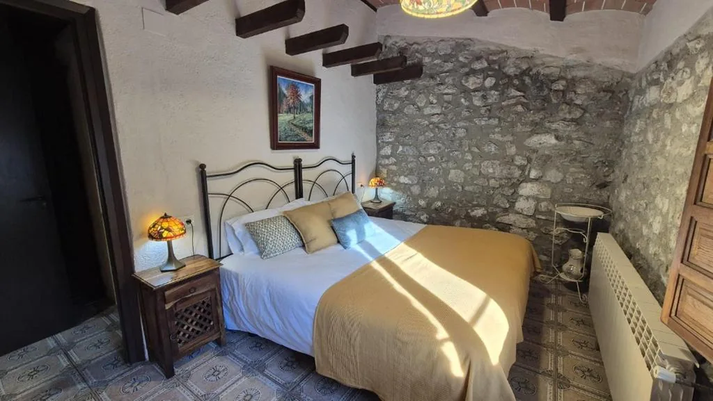 Kamer met groot bed — Can Pei