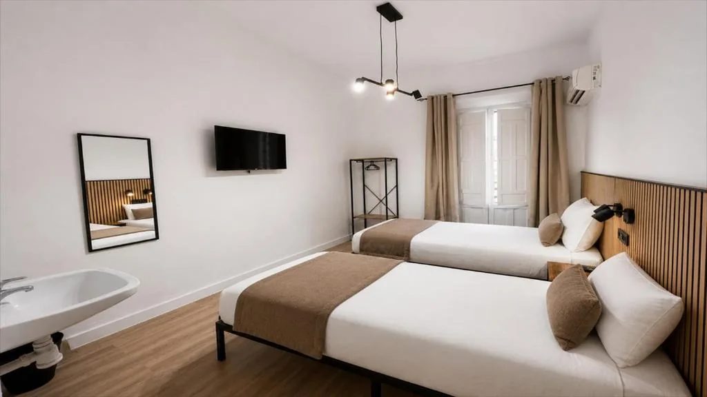 共用バスルーム付きダブルルーム — Casa Antares Granada