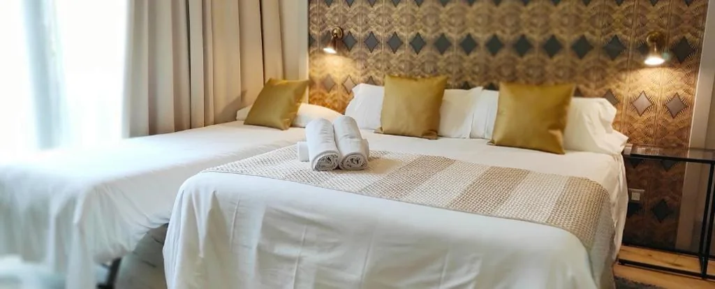 Habitación Doble con cama supletoria (3 adultos) — Casa Balmes
