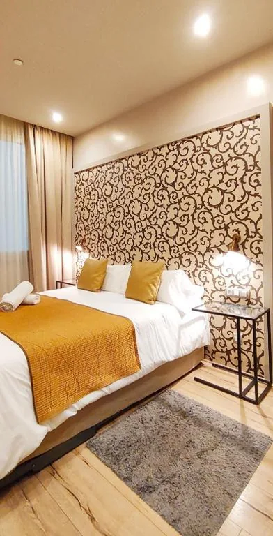 Habitación Doble con vistas al patio y cama supletoria — Casa Balmes