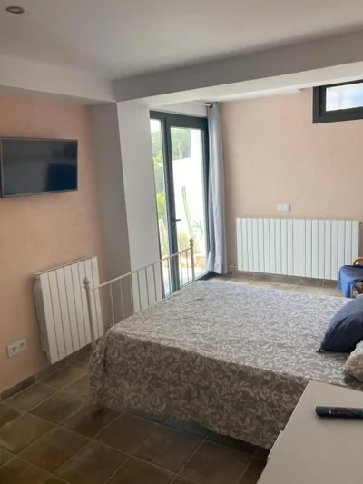 Casa con vista y jardín, a 20' de la playa — Foto 7