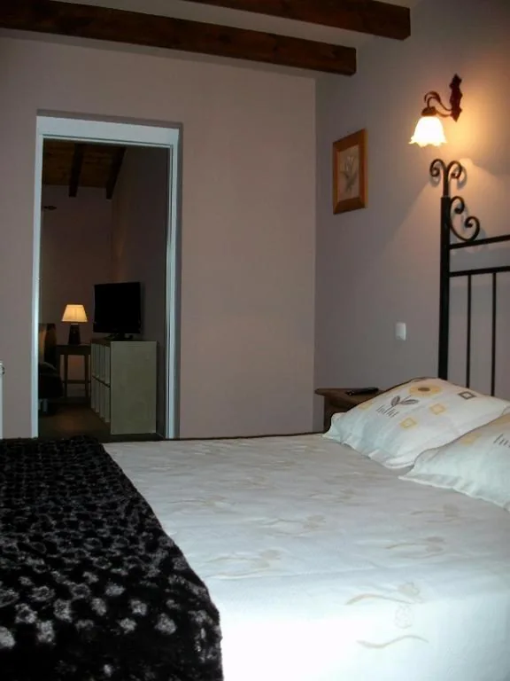 Junior Suite (2 adulti + 2 bambini) — Casa de Labranza Ría de Castellanos