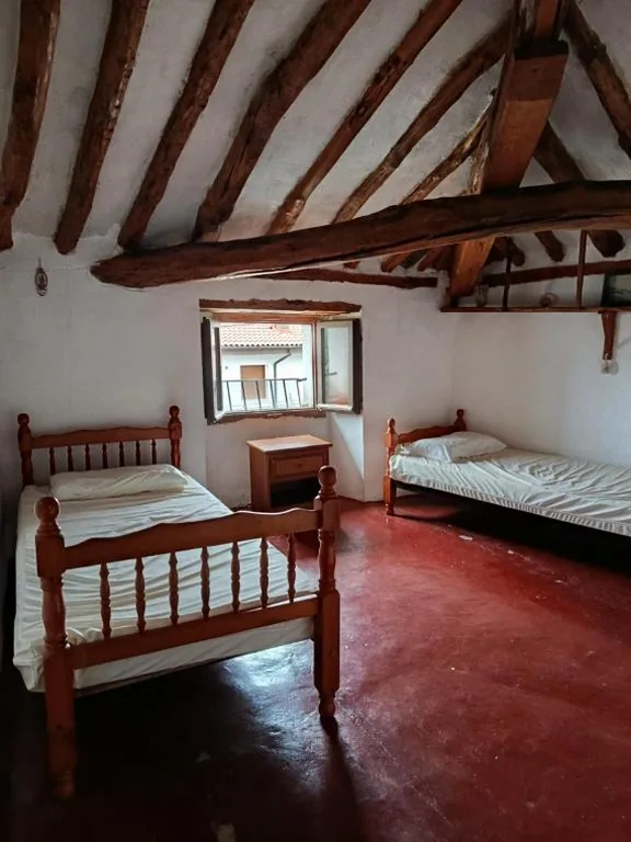 Letto singolo in camera condivisa — Casa de peregrinos La PerlaNegra