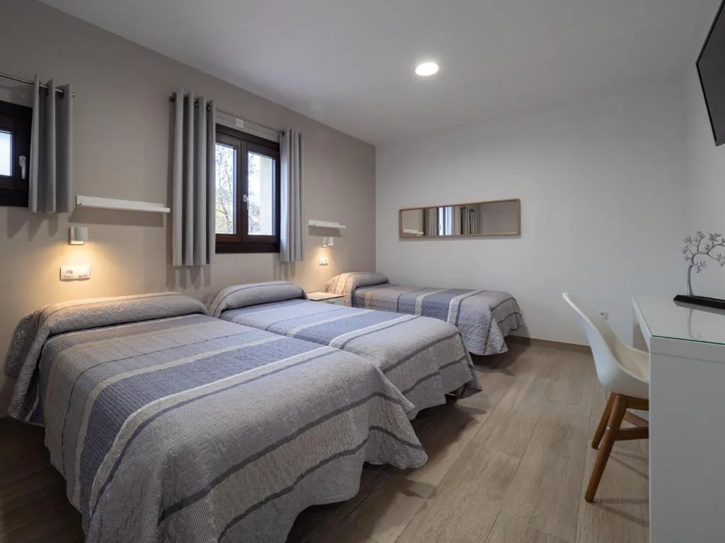 Camera Tripla Superior — Casa Forestal