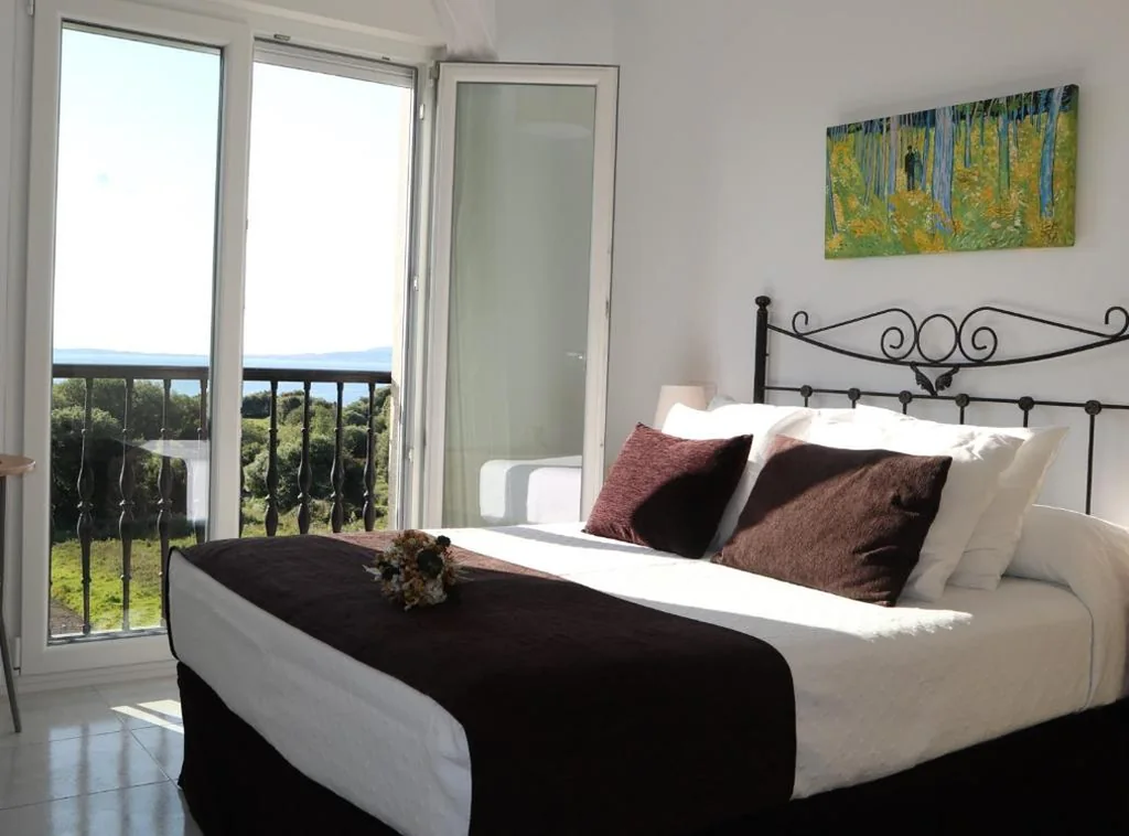 Camera doppia con balcone e vista sul mare — Casa Maria o Grove
