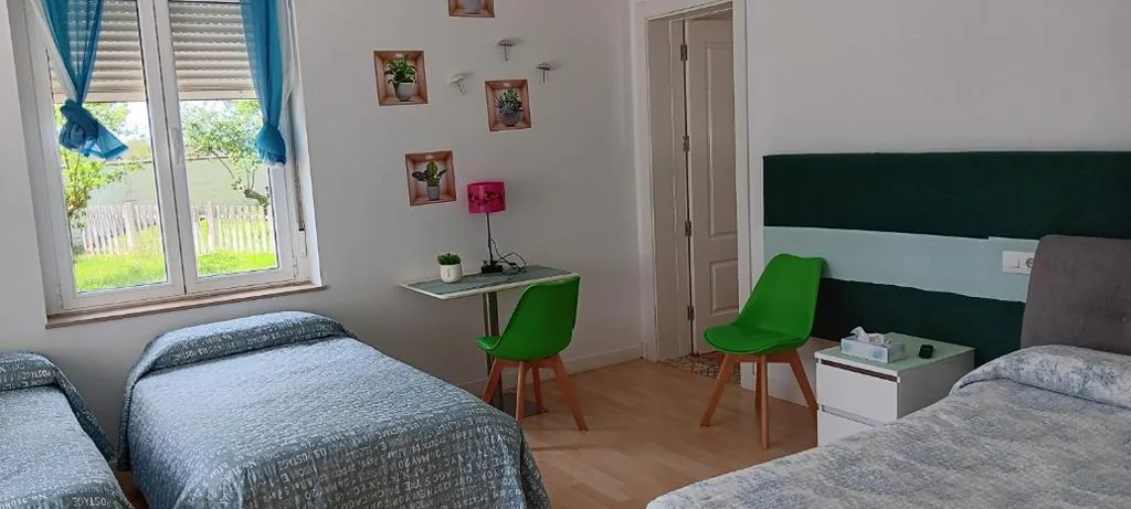 Habitación Familiar con vistas al jardín — CASA MIGUEL y SALLY