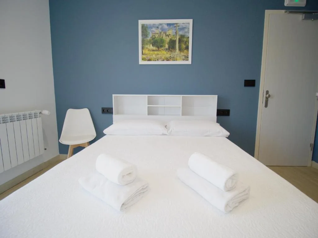 Habitación Deluxe con cama extragrande — CASA MIRADOR REZA Alojamiento Termas
